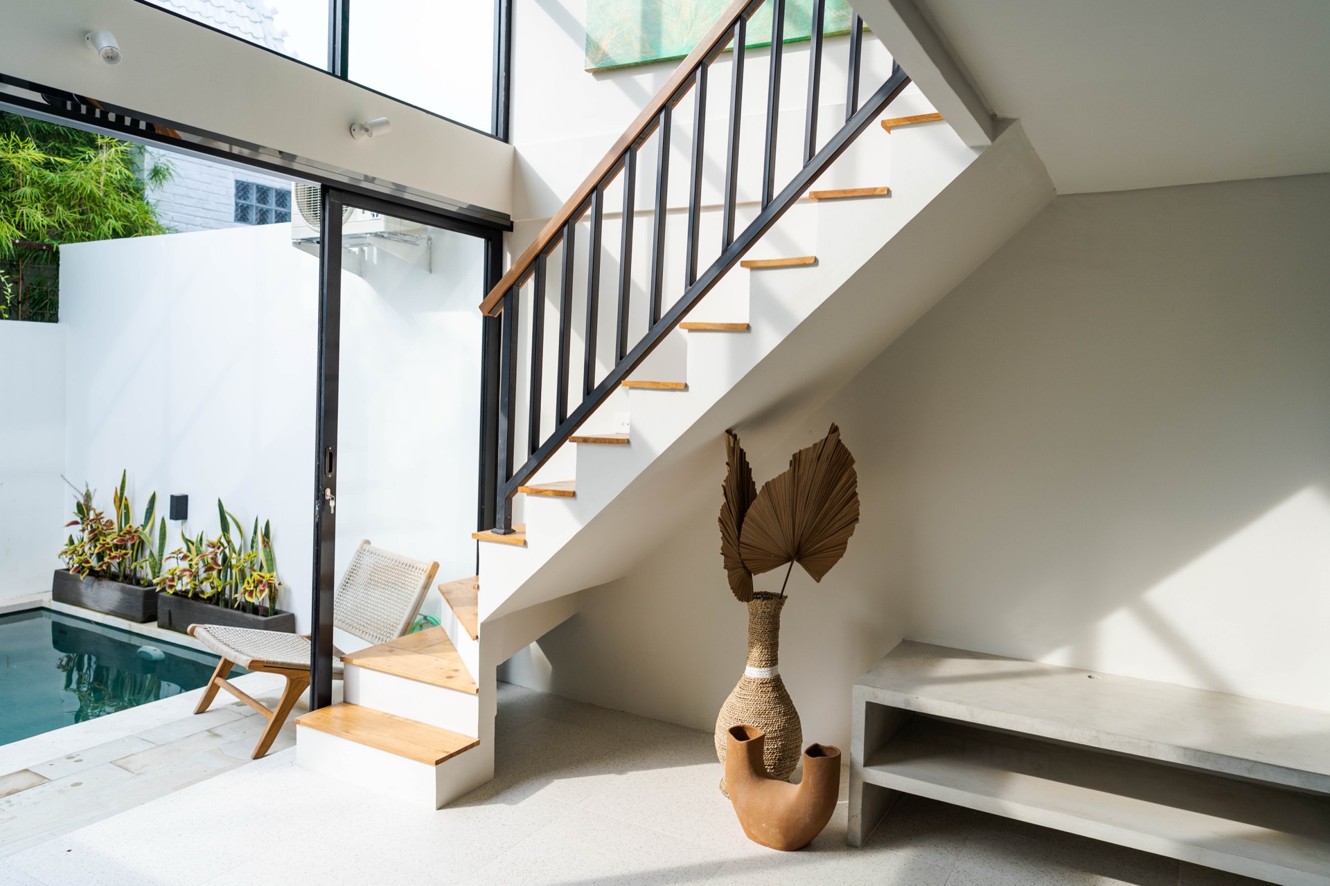 Stair void with pool beyond